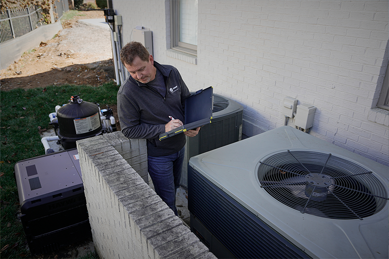 Trane rep checking and fixing outdoor unit